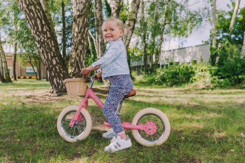 Pierwszy rower biegowy balansujący dziecięcy różowy dla dzieci Trybike CoandCo