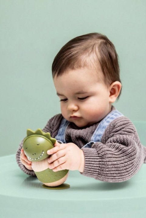 Drewniana silikonowa zabawka do bujania Dinozaur Trixie Baby